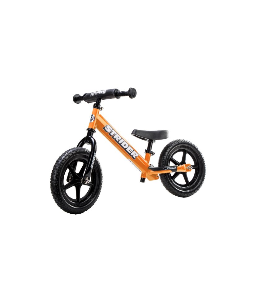 Kid on strider outlet bike